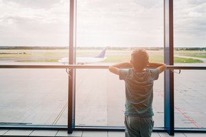 Tired child at the airport, traveling