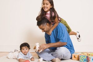 Father playing with children