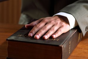 Hand on bible, swearing in