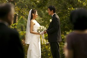 couple at wedding getting married