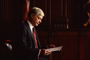 Lawyer reading paperwork