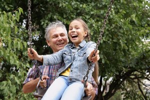 Cheerful father and daughter