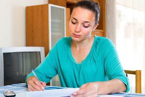 Depressed girl with documents