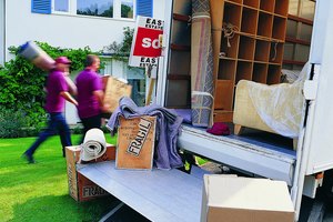 Movers Unloading Moving Van