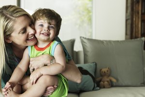 Mother hugging son