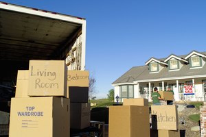 Men moving boxes