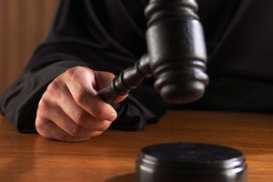 Judge hitting gavel