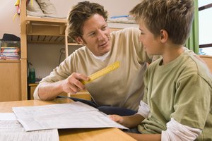 Father helping son with homework