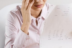 Woman reading paperwork