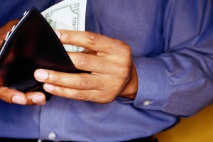 Man Taking Money out of Wallet