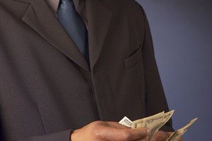 Businessman counting cash