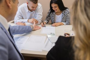 Young bride is signing pre marriage agreement